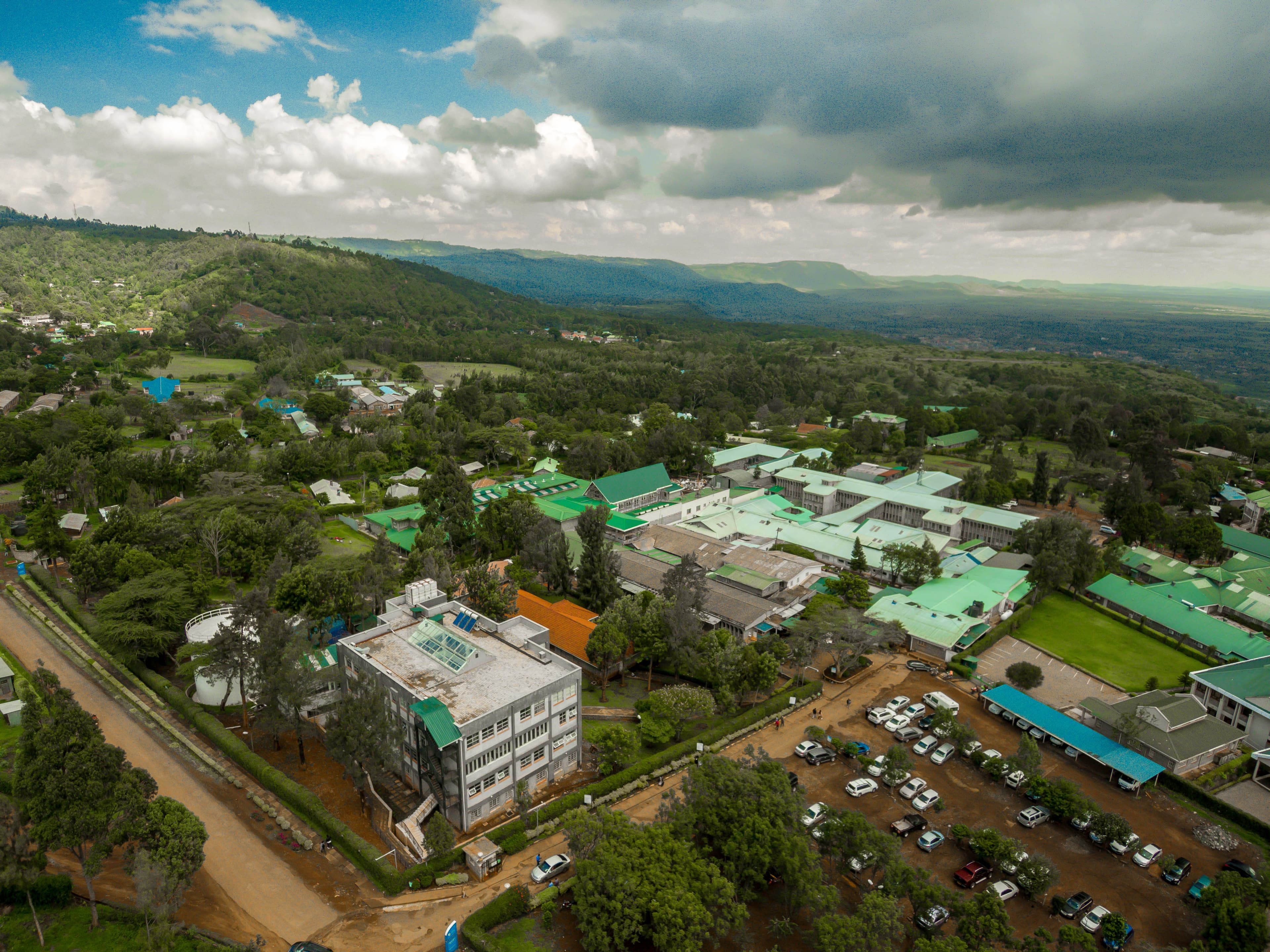 Aerial view of Kijabe Hospital complex nestled in the Great Rift Valley landscape